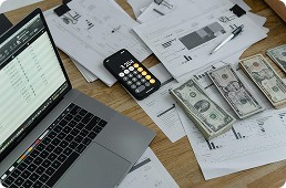 Financial documents and calculator for funding tracking